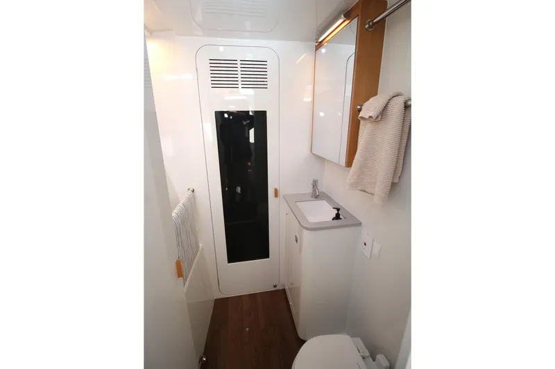 Slide: The Image of Modern bathroom interior of 2026 Chris White Spindrift 47 yacht, featuring sleek design elements. - 9