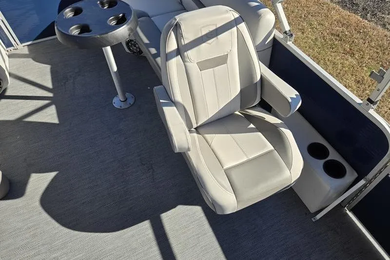 Slide: The Image of 2023 Godfrey Xperience 2286 SBX Sport Tube boat seat with cup holders and table. - 14