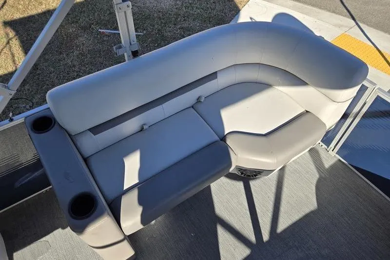 Slide: The Image of 2023 Godfrey Xperience 2286 SBX Sport Tube boat seating with cup holders, top view. - 9