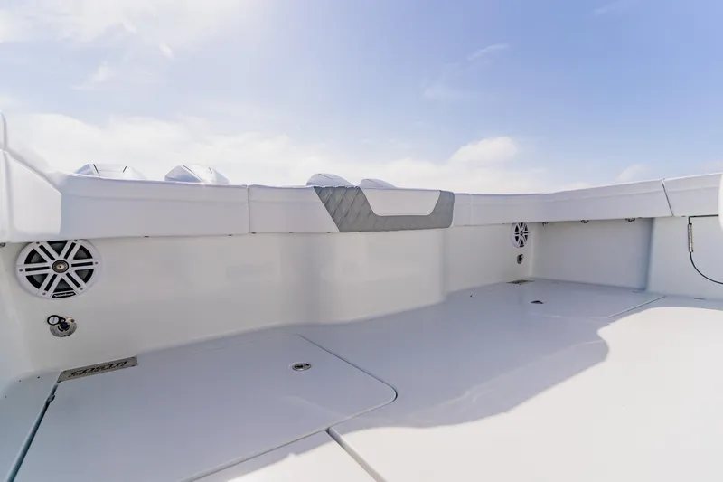Slide: The Image of 2024 Costa Custom Boats 34SV deck with sleek design and integrated speakers. - 12