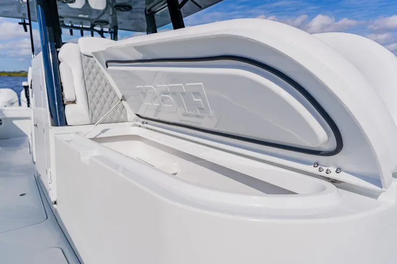 Slide: The Image of 2024 Costa Custom Boats 34SV, open storage compartment, sleek design, luxury marine craftsmanship. - 35