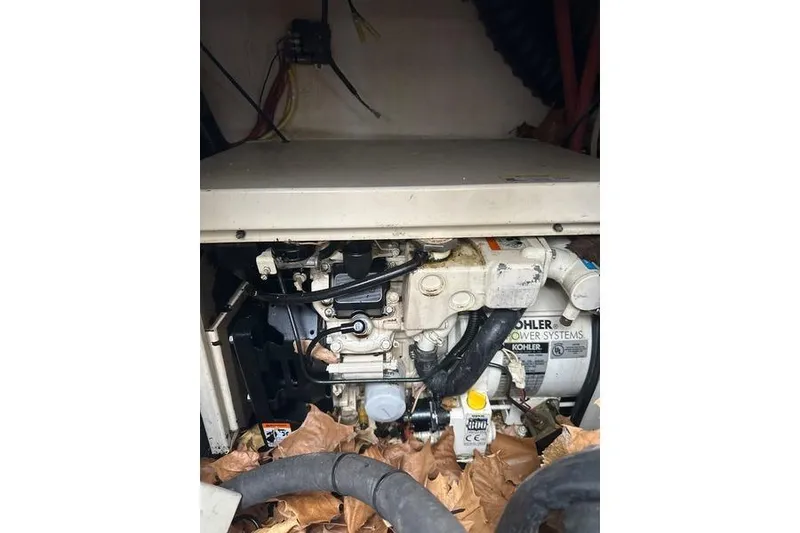 Slide: The Image of Engine compartment of 2004 Chaparral Signature 350 with Kohler power system. - 12