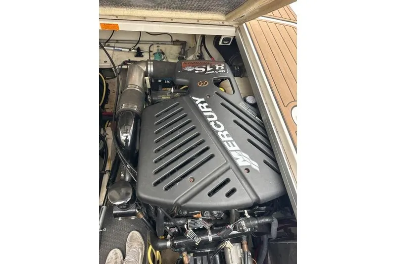 Slide: The Image of Engine compartment of a 2004 Chaparral Signature 350 with Mercury engine. - 15