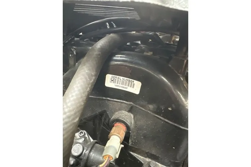 Slide: The Image of Engine compartment of 2004 Chaparral Signature 350 with visible serial number label. - 16