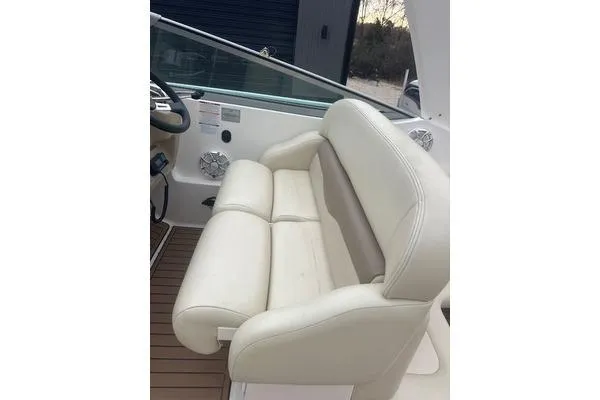 Slide: The Image of 2004 Chaparral Signature 350 boat interior with white leather seating. - 6