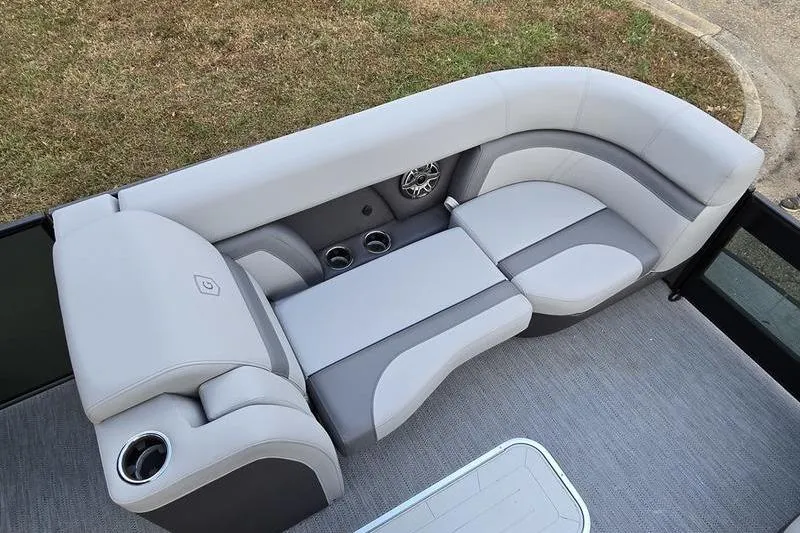 Slide: The Image of 2026 Godfrey Monaco 235 SDB boat interior with plush seating and cup holders. - 10