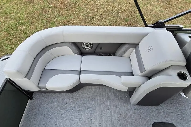 Slide: The Image of Luxurious seating on 2026 Godfrey Monaco 235 SDB pontoon boat, featuring sleek gray upholstery. - 13