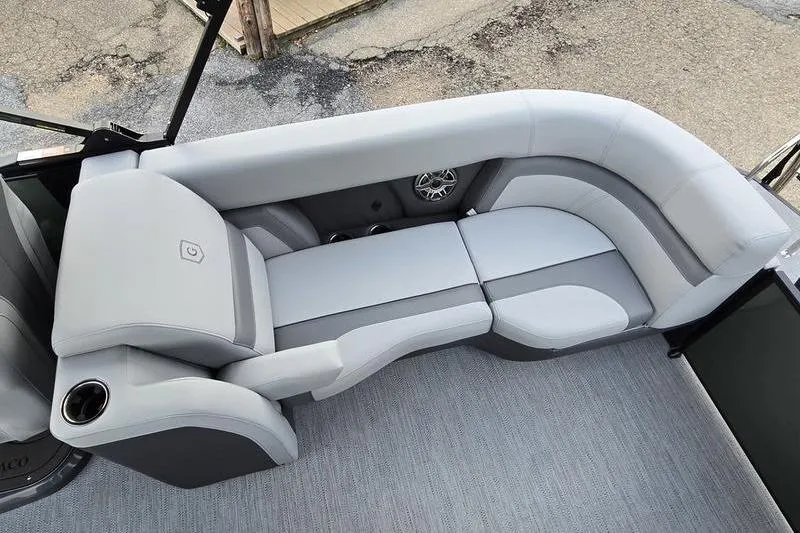 Slide: The Image of Luxurious seating on 2026 Godfrey Monaco 235 SDB pontoon boat, featuring sleek gray upholstery. - 14