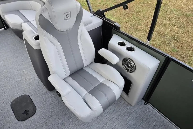 Slide: The Image of Luxurious seating on 2026 Godfrey Monaco 235 SDB pontoon boat with cup holders and speaker. - 6