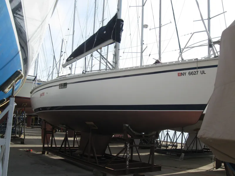 Slide: The Image of 1995 Hunter 35.5 sailboat on dry dock. - 2
