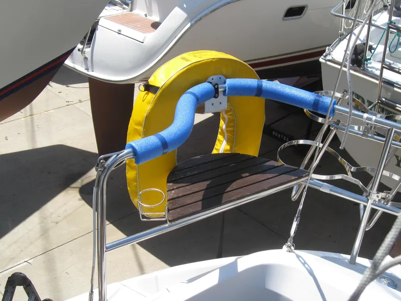 Slide: The Image of Yellow life preserver on a 1995 Hunter 35.5 boat. - 20