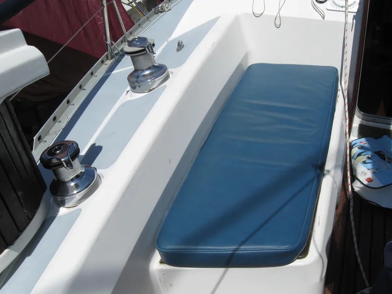 Slide: The Image of Hunter 35.5 sailboat 1995, cockpit with blue cushion and winches. - 21