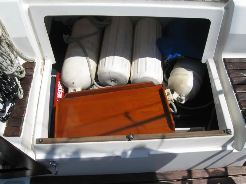 Slide: The Image of Storage compartment on a 1995 Hunter 35.5 boat. - 23