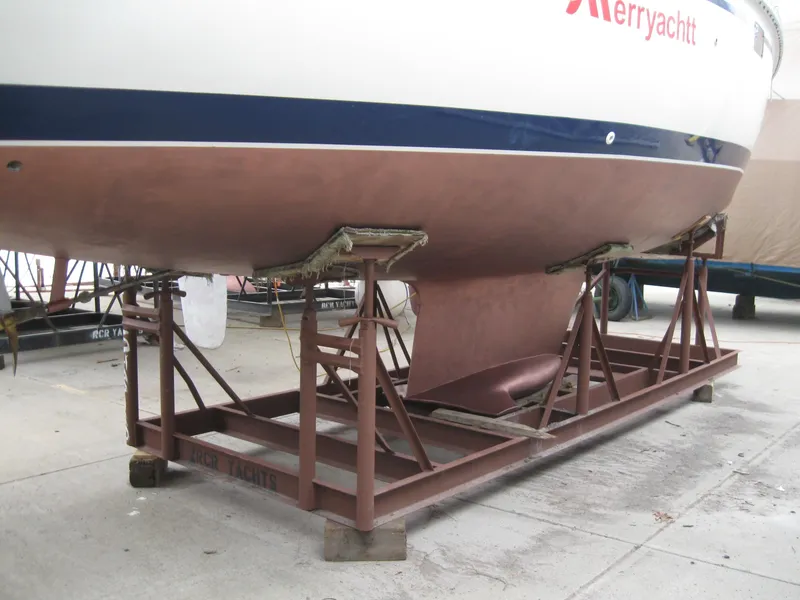 Slide: The Image of 1995 Hunter 35.5 sailboat on a dry dock. - 4