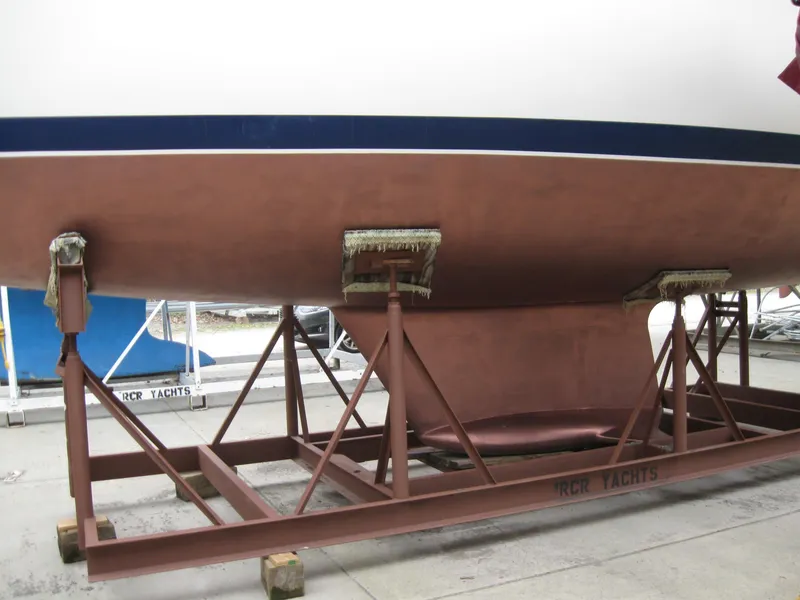 Slide: The Image of 1995 Hunter 35.5 sailboat on dry dock stand. - 5
