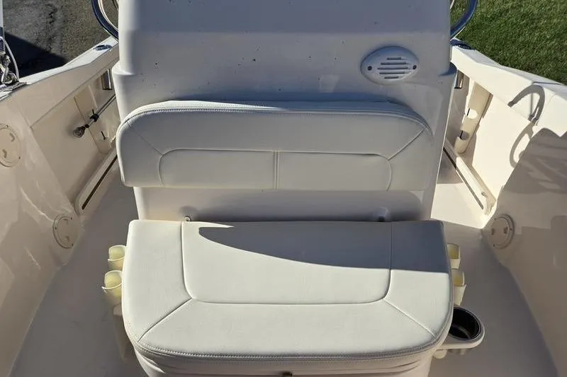 Slide: The Image of 2026 Grady-White Fisherman 180 boat seating area with white cushioned seats. - 14