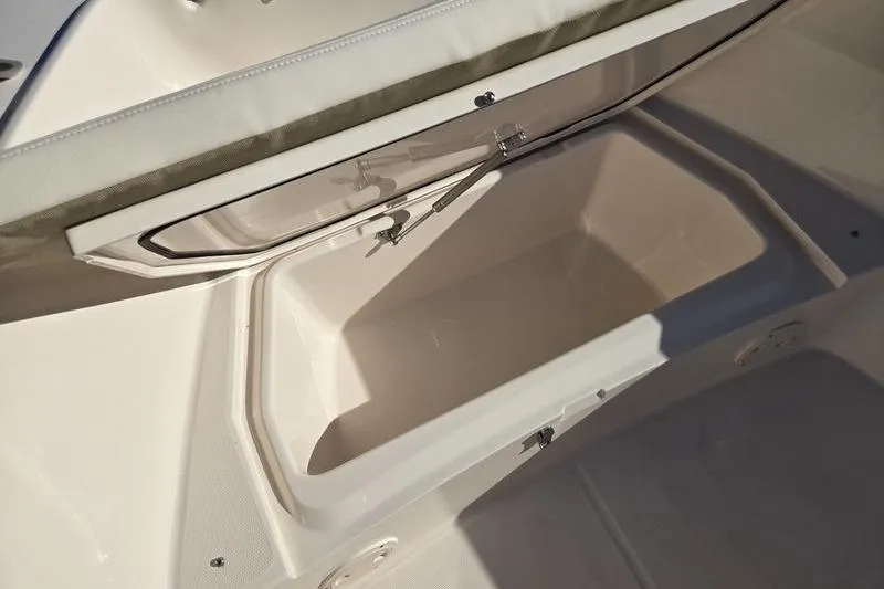 Slide: The Image of Storage compartment on 2026 Grady-White Fisherman 180 boat, open and empty. - 15