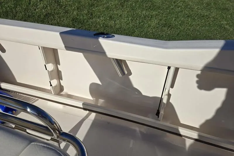 Slide: The Image of Interior view of 2026 Grady-White Fisherman 180 boat, featuring seating and storage. - 5