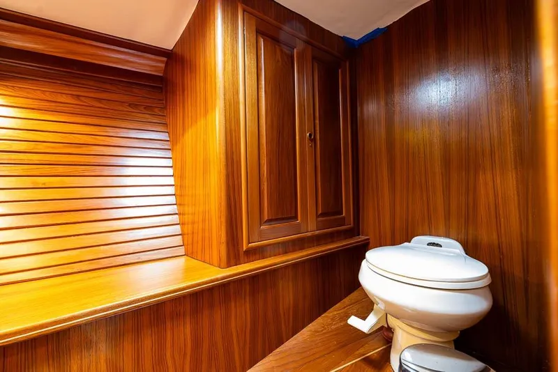 Slide: The Image of Wood-paneled bathroom interior of 1974 C&C 61 Ocean Racer/Cruiser yacht. - 27