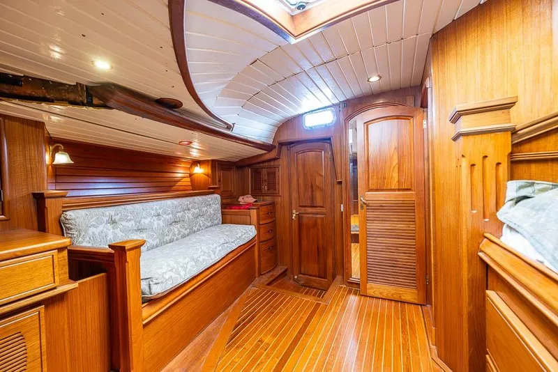 Slide: The Image of Luxurious wooden interior of a 1974 C&C 61 Ocean Racer/Cruiser yacht cabin. - 29
