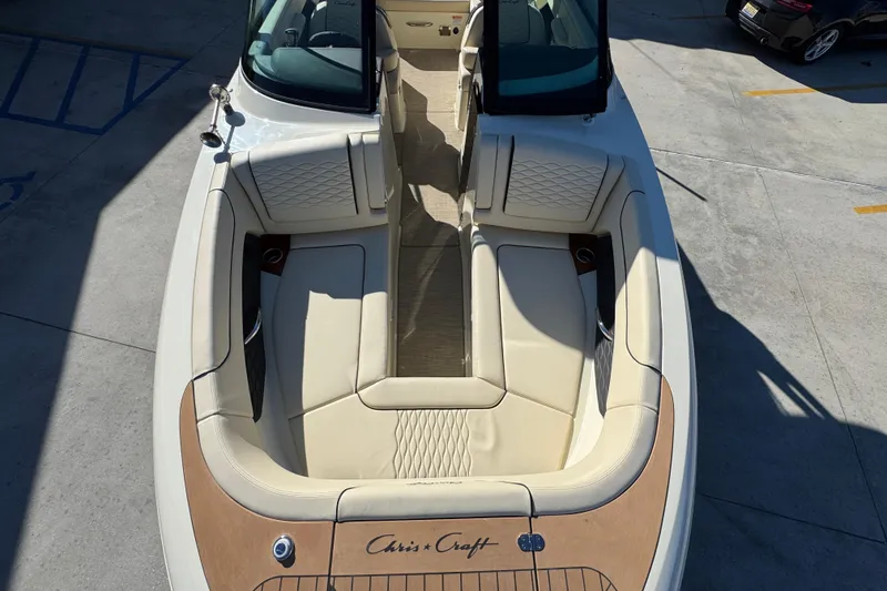 Slide: The Image of 2026 Chris-Craft Sportster 28 boat with luxurious seating and elegant design. - 20