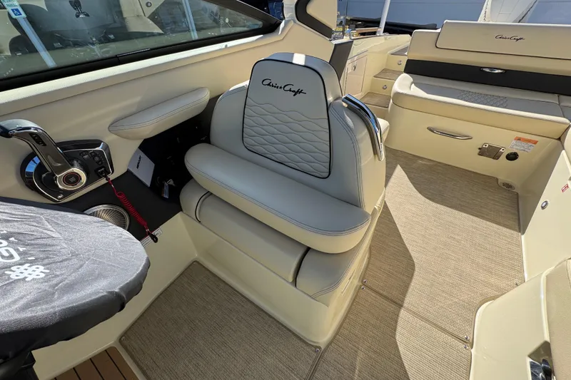 Slide: The Image of 2026 Chris-Craft Sportster 28 interior with luxurious seating and modern controls. - 25