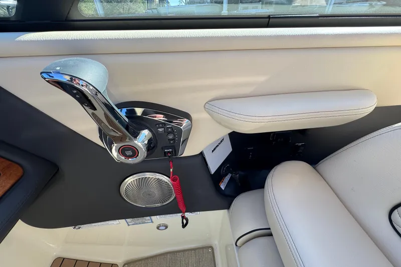 Slide: The Image of Interior of 2026 Chris-Craft Sportster 28, featuring sleek controls and luxurious seating. - 30