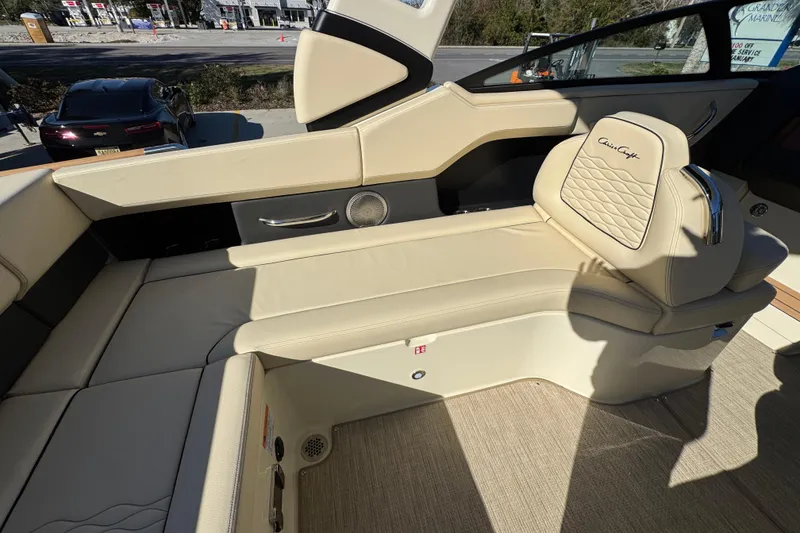 Slide: The Image of Luxurious interior of 2026 Chris-Craft Sportster 28 boat with beige leather seating. - 37