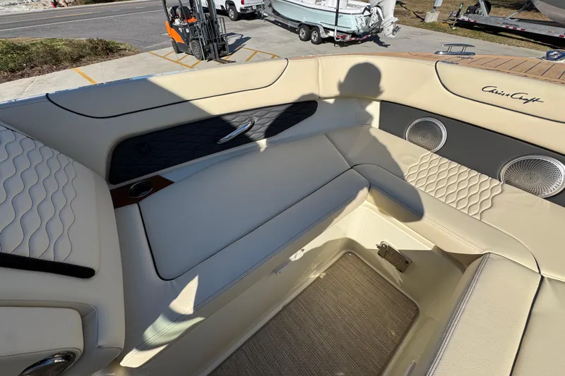 Slide: The Image of 2026 Chris-Craft Sportster 28 interior with beige seating and stylish design elements. - 45