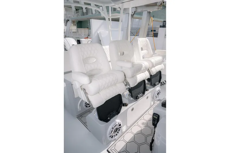 Slide: The Image of 2024 Contender 44 ST boat interior with luxurious white seating and modern design. - 34