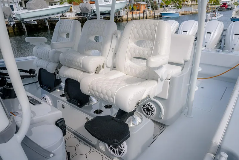 Slide: The Image of 2024 Contender 44 ST boat with luxurious white seating and modern design. - 59