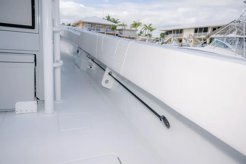 Slide: The Image of 2024 Contender 44 ST boat deck with sleek white design and modern features. - 61