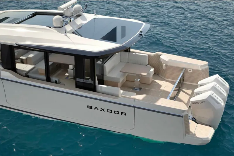 Slide: The Image of 2026 Saxdor 460 GTC luxury yacht on clear blue water, featuring spacious deck and triple Mercury engines. - 1
