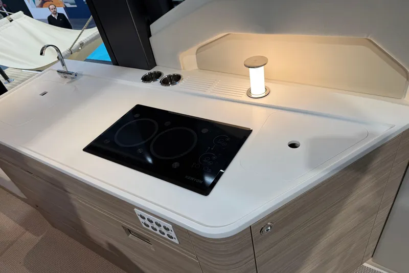 Slide: The Image of Modern kitchen area on 2026 Saxdor 460 GTC yacht with stove and sink. - 11