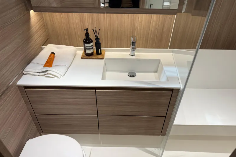 Slide: The Image of Modern bathroom in 2026 Saxdor 460 GTC yacht with sleek wood cabinetry and elegant fixtures. - 20