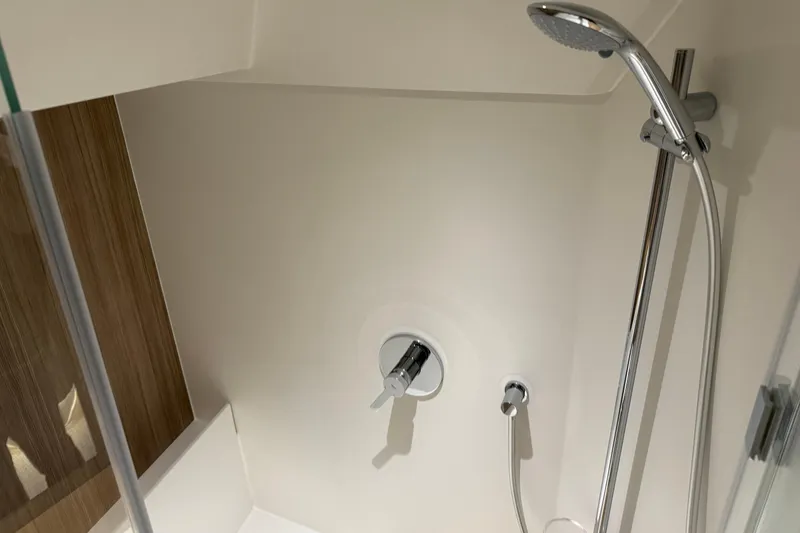 Slide: The Image of Shower area in 2026 Saxdor 460 GTC boat, featuring modern fixtures and sleek design. - 21