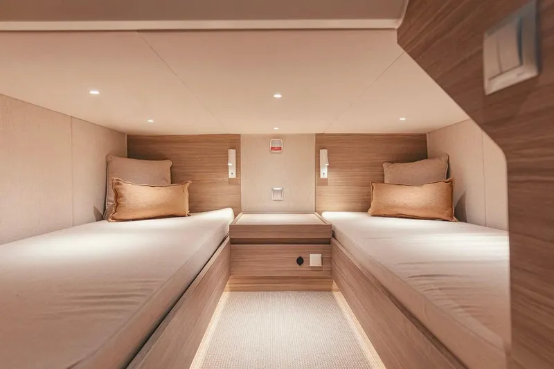 Slide: The Image of Luxurious cabin interior of 2026 Saxdor 460 GTC yacht with twin beds and modern lighting. - 23