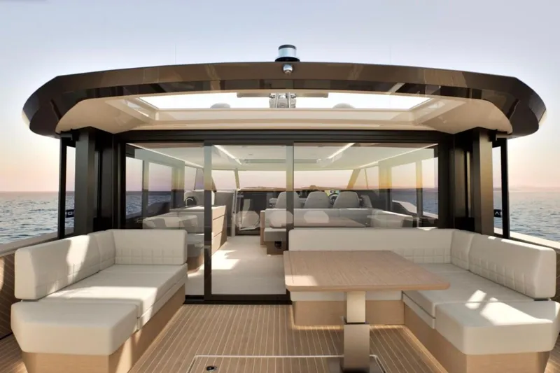 Slide: The Image of Luxurious Saxdor 460 GTC yacht interior, 2026 model, featuring elegant seating and ocean view. - 5