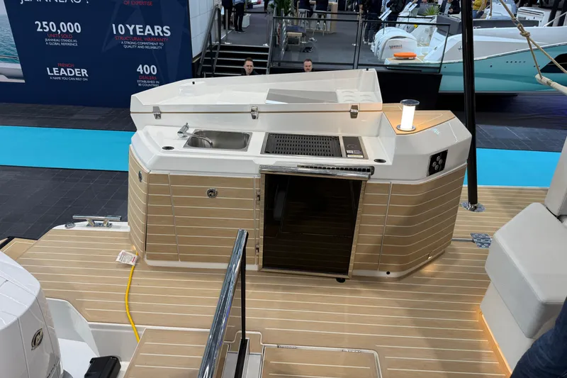 Slide: The Image of 2026 Saxdor 460 GTC boat interior with modern kitchenette and sleek design. - 8