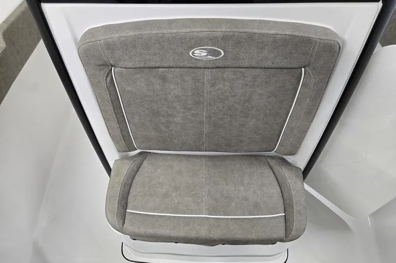 Slide: The Image of Gray cushioned seat on 2026 Sea Hunt Ultra 265 SE boat, featuring sleek design. - 3