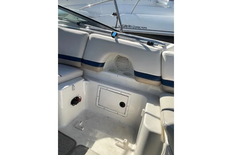 Slide: The Image of Interior of a 1998 Chaparral 2835 SS boat, featuring seating and storage compartments. - 34