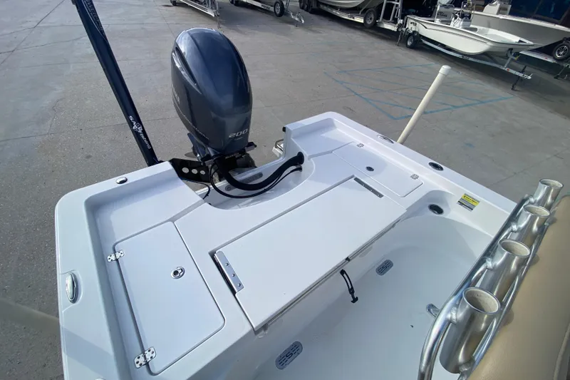 Slide: The Image of 2015 Sportsman Masters 227 Bay Boat with Yamaha 200 engine, docked at marina. - 16