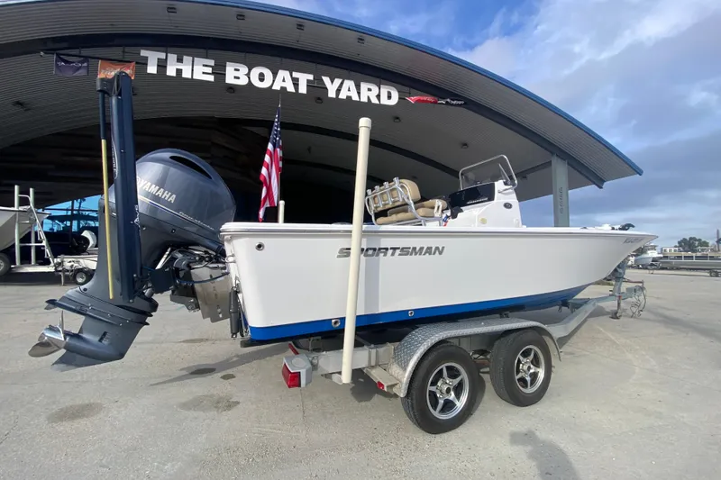 Slide: The Image of 2015 Sportsman Masters 227 Bay Boat on trailer at The Boat Yard. - 2
