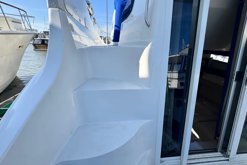 Slide: The Image of Staircase on a 1997 Carver 350 Mariner yacht, leading to the deck. - 17