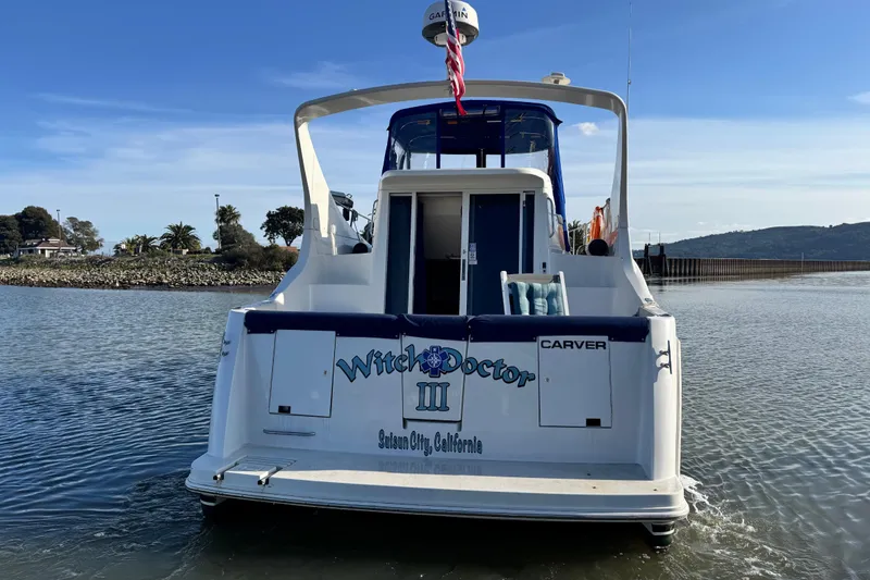 Slide: The Image of 1997 Carver 350 Mariner boat on water, rear view, Suisun City, California. - 6