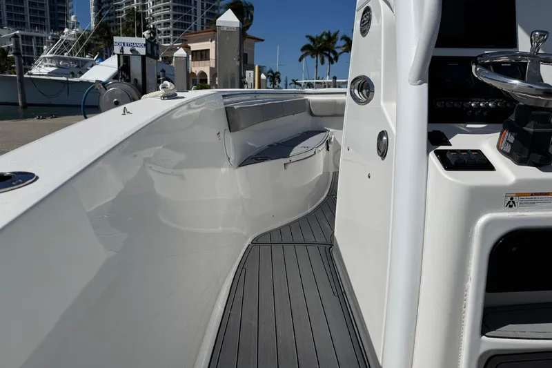 Slide: The Image of 2022 Sea Pro 259 Center Console boat interior with sleek design and modern controls. - 19