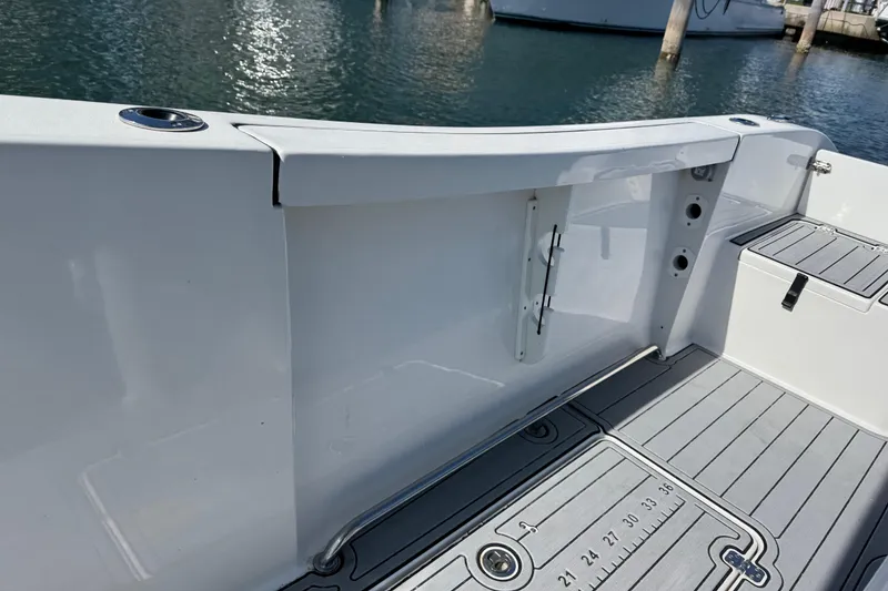 Slide: The Image of Interior view of 2022 Sea Pro 259 Center Console boat deck. - 30