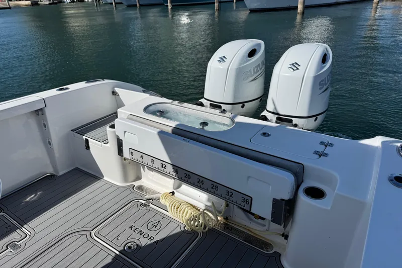 Slide: The Image of 2022 Sea Pro 259 Center Console boat with dual Suzuki outboard motors. - 33
