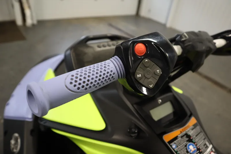 Slide: The Image of 2024 Sea-Doo Spark Trixx 3up handlebar controls with vibrant design. - 12