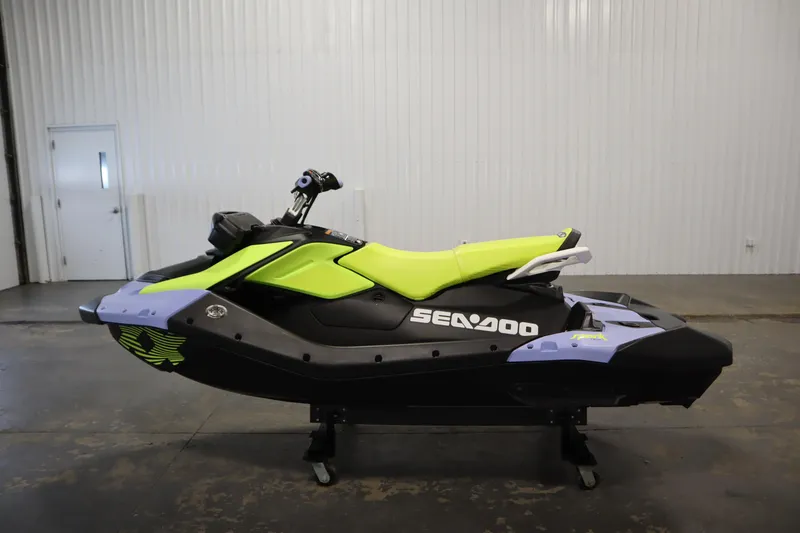 Slide: The Image of 2024 Sea-Doo Spark Trixx 3up jet ski in vibrant lime and black. - 8